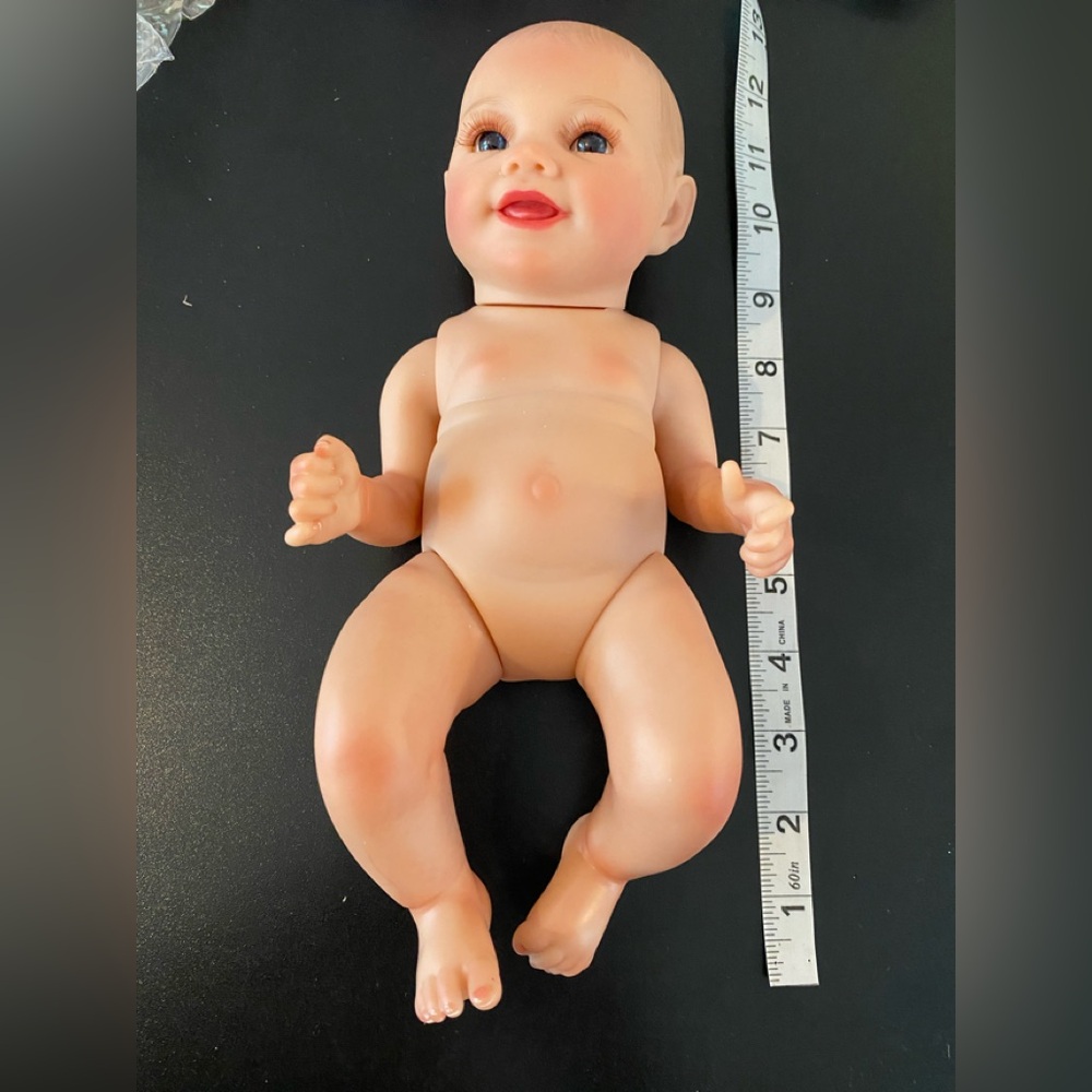 Realistic and Life—Like Soft Vinyl Baby Doll